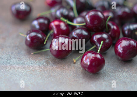Fresh cherry fruits on the table with selective focus point Stock Photo