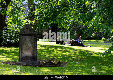 People meet in the cemetery, Edinburgh, Scotland, United Kingdom Stock Photo