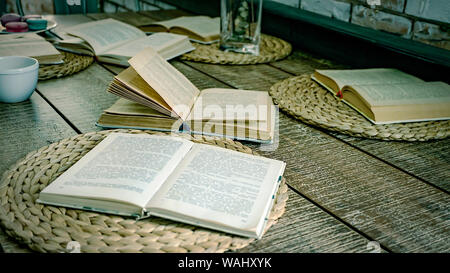 Opened books, old table, blank pages, background paper, colored pencils, blank pages, blank, old, vintage, school Stock Photo