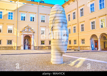 SALZBURG, AUSTRIA - FEBRUARY 27, 2019: The modern sculpture Awilda by artist Jaume Plensa located in the courtyard of Toskana Trakt of University, on Stock Photo