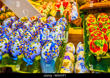 The beautiful handpainted Easter eggsgelves with floral ornament in festive shop in Salzburg, Austria Stock Photo