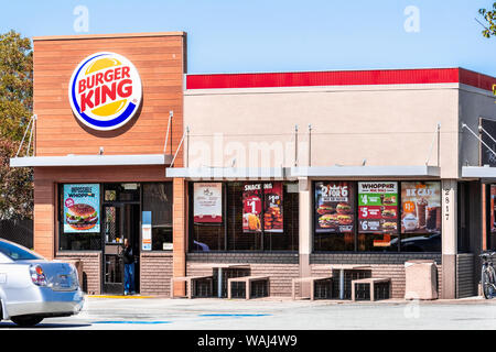 August 19, 2019 San Mateo / CA / USA - Burger King fast food restaurant entrance, advertising several offers among which the Impossible Whopper, a new Stock Photo