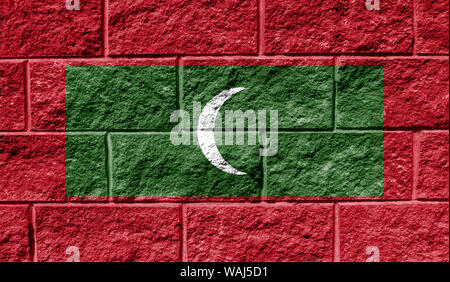 Flag of Maldives close up painted on a cracked wall Stock Photo