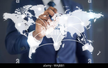 Businessman showing with connections on the word map Stock Photo