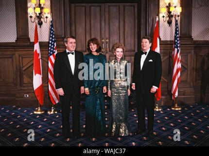 March 3, 1985. President Ronald Reagan and First Lady Nancy Reagan with Prime Minister Brian Mulroney and wife Mila Mulroney pose before a gala in the Grand Theater de Quebec during a state visit to Canada. Stock Photo