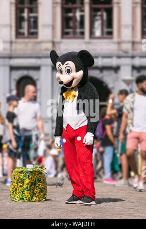 Street-entertainer on Dam Square. Street-Artists and entertainers can be found all across Amsterdam, especially in the tourist season. Stock Photo