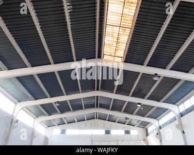 Interior of the old warehouse with clerestory on the roof. Stock Photo