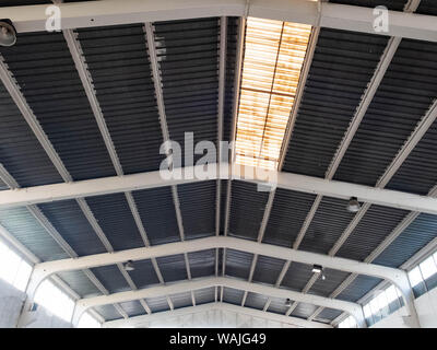 Interior of the old warehouse with clerestory on the roof. Stock Photo
