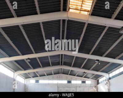 Interior of the old warehouse with clerestory on the roof. Stock Photo