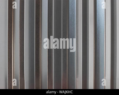 Stainless galvanized profiled sheet. Background or texture concept. Top view. Seamless pattern. Stock Photo