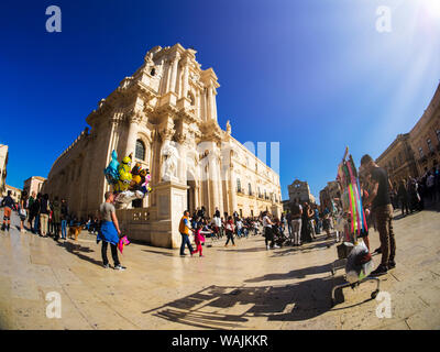 Italy, Sicily. Ortygia. Piazza del Duomo with Tourist Stock Photo