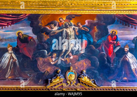 Jesus and angels paintings, Palazzo Ducale (Doge's Palace), Venice, Italy. Doge's Palace was the residence of the Venetian ruler from 1200's to 1787. Meeting Room Grand Council. Painting from 1500's Stock Photo