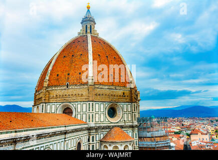 Large dome golden cross, Duomo Cathedral, Florence, Italy. Finished 1400's. Formal name Cathedral di Santa Maria del Fiore. Stock Photo