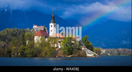 Europe, Slovenia, Lake Bled. Rainbow over lake and church. Credit as: Jim Nilsen / Jaynes Gallery / DanitaDelimont.com Stock Photo