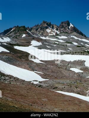 USA, Oregon, Deschutes National Forest. Three Sisters Wilderness, Broken Top and lingering snow from previous winter, view west from Tam McArthur Rim.