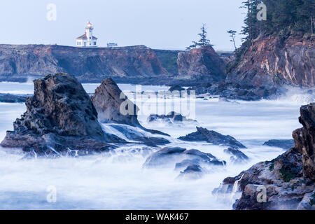 Winter storm watching, Cape Arago Lighthouse from Shore Acres State Park, Southern Oregon Coast, USA Stock Photo