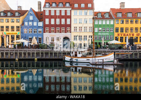 Nyhavn - a waterfront, canal and entertainment district in Copenhagen, Denmark Stock Photo