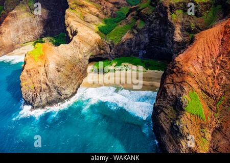 Honopu Arch and Honopu Beach on the Na Pali Coast, Coast Wilderness State Park, Kauai, Hawaii, USA. Stock Photo