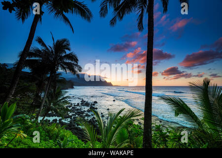 Sunset over the Na Pali Coast from Hideaways Beach, Princeville, Kauai, Hawaii, USA. Stock Photo
