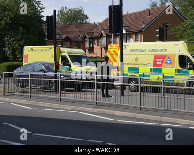 Ambulances at an accident scene on a pedestrian crossing on a dual carriageway, Topp Way, Bolton, Lancashire, England UK. photo DON TONGE