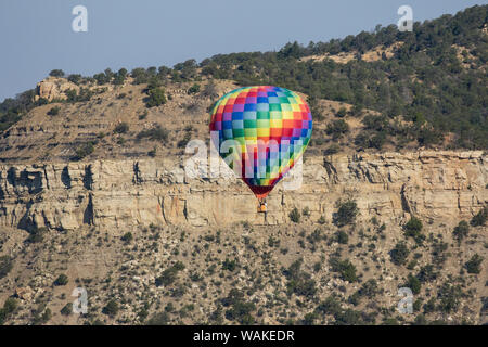 Hot air balloon bringing color to the sky. Stock Photo