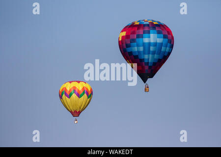 Hot air balloon bringing color to the sky. Stock Photo