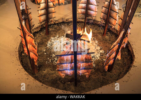 Salmon cooked traditional Indian Style, Tillicum Village on Blake Island (birthplace of Chief Seattle), Seattle, Washington State, USA Stock Photo