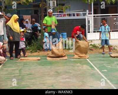 Sack race for children, celebrating the 74th anniversary of Indonesia's independence Stock Photo