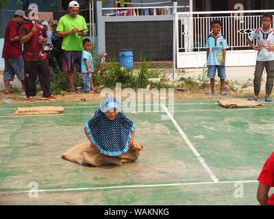 Sack race for children, celebrating the 74th anniversary of Indonesia's independence Stock Photo