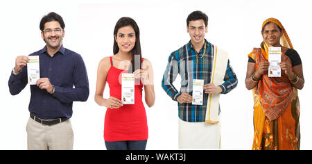 Indian people showing their Aadhar cards Stock Photo
