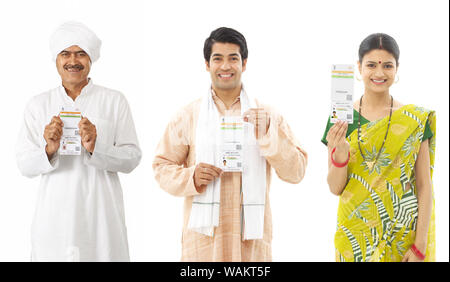 Indian people showing their Aadhar cards Stock Photo