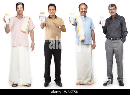 Indian people showing their Aadhar cards Stock Photo