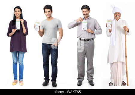 Indian people showing their Aadhar cards Stock Photo