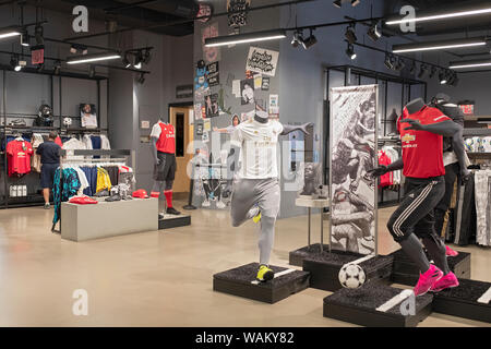 Soccer jerseys and equipment for sale at the Adidas store on Broadway in Greenwich Village, Manhattan, New York City.