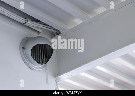 Air vent ducting ventilation exhaust mounted on the wall. Stock Photo