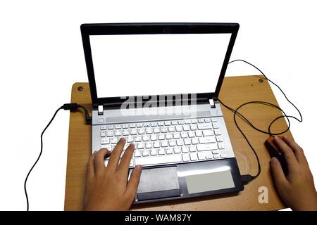 Human hand  typing on keyboard Thai and English letters  on generic laptop at table isolated on white background, Business through social network Stock Photo