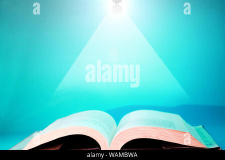 Hanging light on book Stock Photo