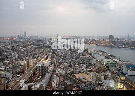 View towards Osaka Bay Area in Osaka. Within view is the Universal Studios theme park, and the Tempozan area including the Osaka Aquarium Kaiyukan and Stock Photo