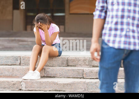 Break up. Boyfriend leaving his girlfriend after argue Stock Photo