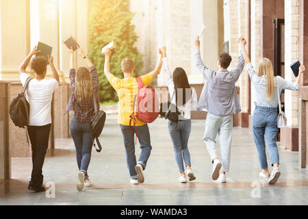 Pass exams. Students walking in college campus Stock Photo