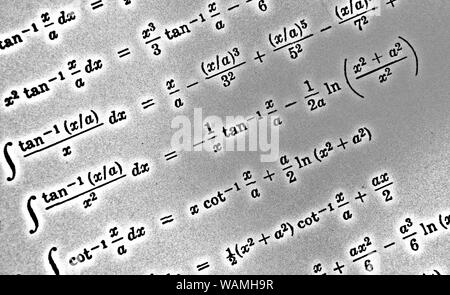 Large number of mathematical formulas on a white background HDR Stock Photo