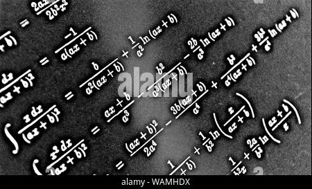 Large number of mathematical formulas on a black background HDR Stock Photo