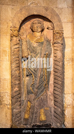Ancient stone carved effigy of Saint Felix, Norwich Cathedral, Norfolk, England, UK Stock Photo
