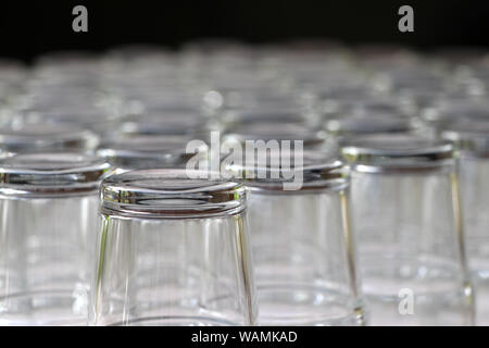 Glass of water that washed and overturned on the table. Stock Photo