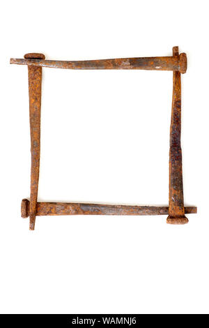Backgrounds - Antique rusty square nails used as design elements, isolated on white background Stock Photo