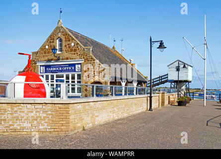 A view of the Harbour Office and tide recording station on the North Norfolk coast at Wells-next-the-Sea, Norfolk, England, United Kingdom, Europe. Stock Photo