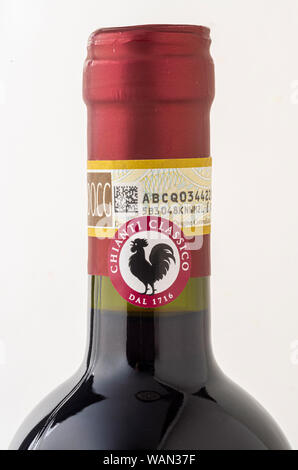 The Chianti Classico seal, a black rooster (Gallo Nero) on a white background with a bordeaux coloured frame on bottle of red wine Stock Photo