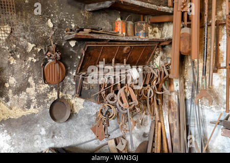 Forged parts in an old workshop Stock Photo