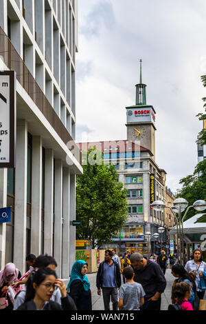 Stuttgart, Germany, August 15, 2019, Crowd of people walking at rotebuehlplatz square in downtown stuttgart where many shops are located with view to Stock Photo