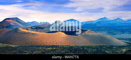 Impressive volcanic landscape in Timanfaya National park,Lanzarote island,Spain. Stock Photo